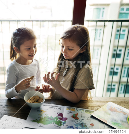 Girls Eating Cookies Snack Concept Girls Eating Cookies Snack Concept 25494324