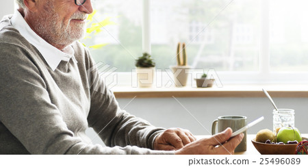 Senior Adult Holding Tablet Reading Concept 25496089