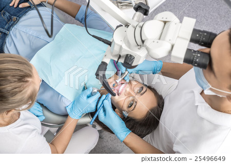 Treatment at dentist's office 25496649