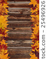 maple leaves and wooden background 25496926