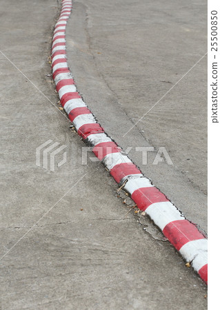 red and white marking sign on road 25500850