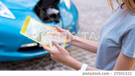 Pleasant young woman using modern device Pleasant young woman using modern device 25501322