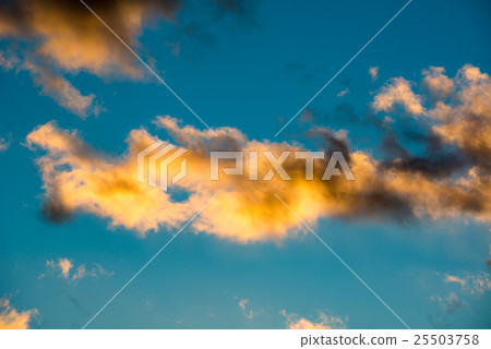 Puffy and colorful sunset clouds Puffy and colorful sunset clouds 25503758