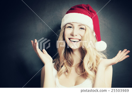 Christmas Woman in Santa Hat Having Fun 25503989