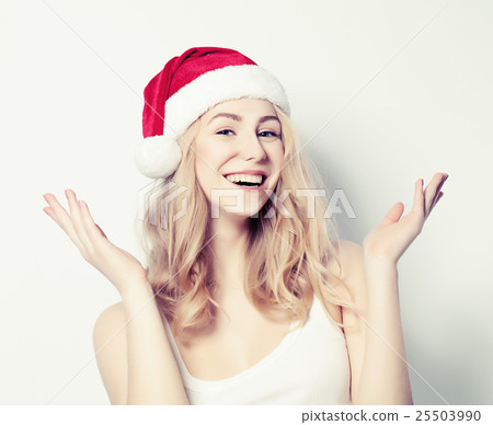 Happy Christmas Woman in Santa Hat Happy Christmas Woman in Santa Hat 25503990