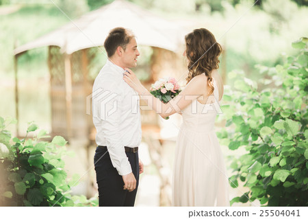 Lovely couple in love kissing each other on the 25504041