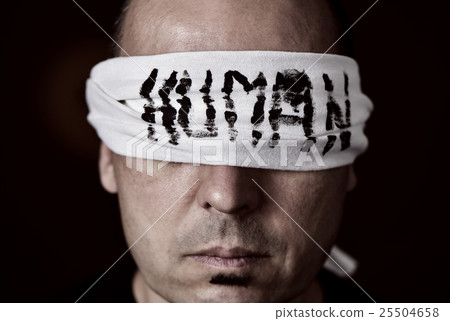 young man with a blindfold in his eyes young man with a blindfold in his eyes 25504658