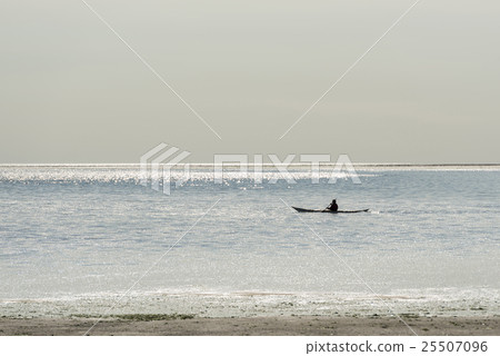 Canoeist on the Wadden Sea at Vlieland. Canoeist on the Wadden Sea at Vlieland. 25507096
