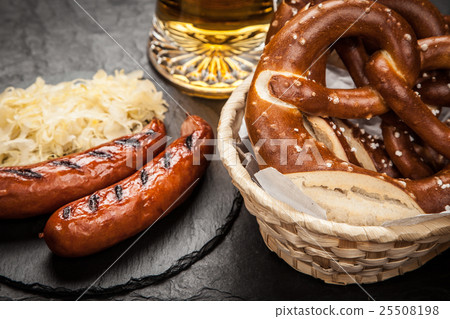 Pretzels, bratwurst and sauerkraut Pretzels, bratwurst and sauerkraut 25508198