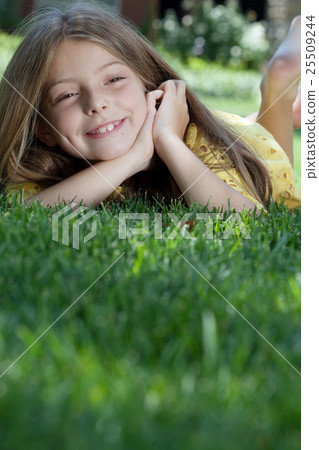 girl on grass girl on grass 25509244