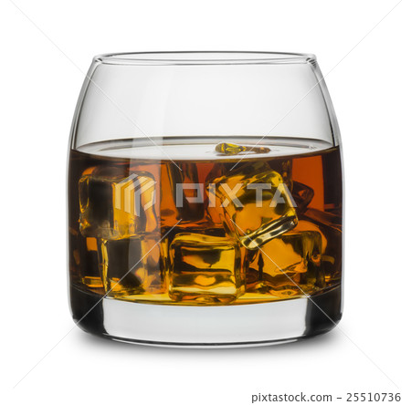 Glass of scotch whiskey with ice cubes 25510736