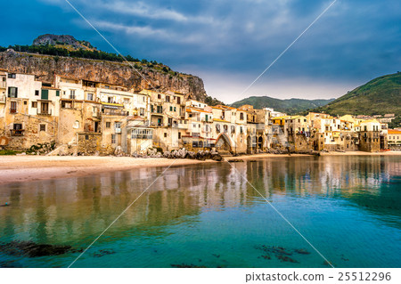 View on habour and old houses in Cefalu at night 25512296