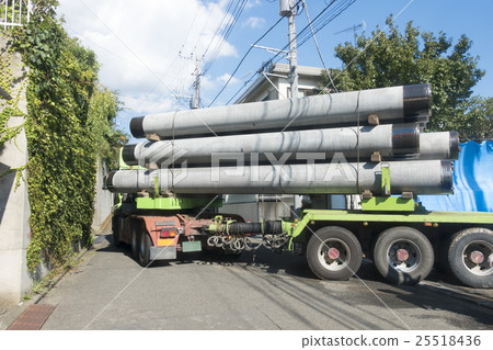 Housing concrete pile construction site material Material condominium · building pile transport trailer Housing concrete pile construction site material Material condominium · building pile transport trailer 25518436