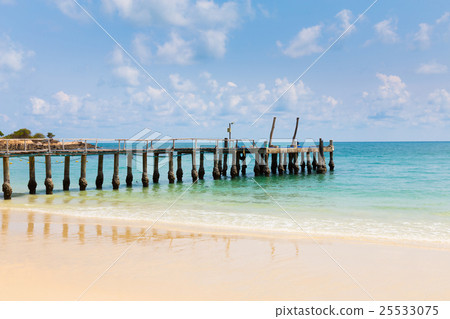 Fishing boat jetty over the beach 25533075