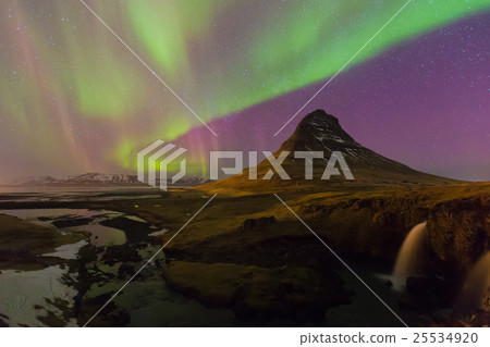 Northern lights night view over Kirkjufell volcano Northern lights night view over Kirkjufell volcano 25534920