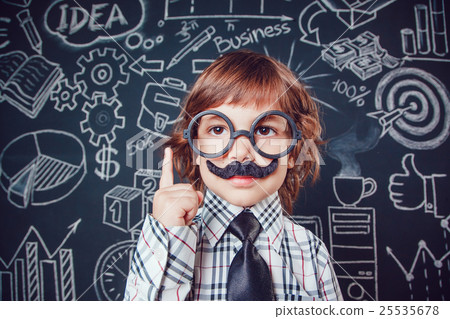 Little boy as businessman or teacher with mustache 25535678