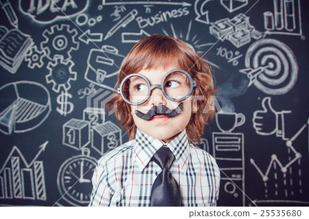 Little boy as businessman or teacher with mustache 25535680