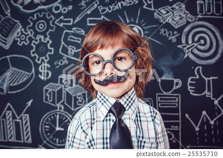 Little boy as businessman or teacher with mustache 25535710