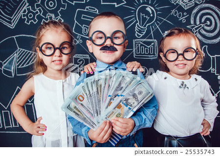 Little boy in glasses and mustache on dark 25535743