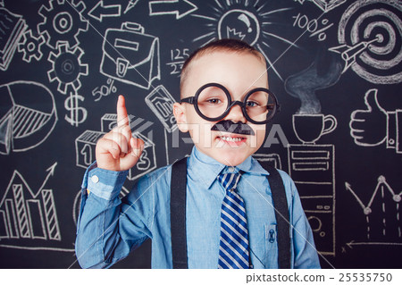 Little boy as businessman or teacher with mustache 25535750