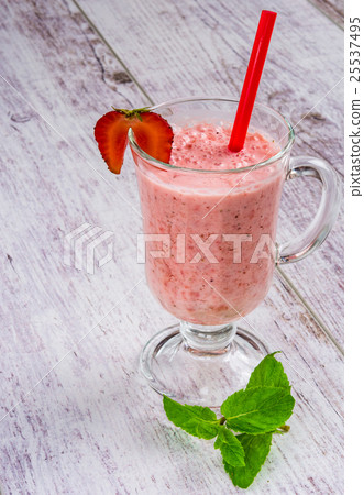 smoothie of strawberries on a table smoothie of strawberries on a table 25537495