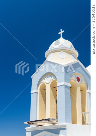 A fragment of a white church with a cross A fragment of a white church with a cross 25540538