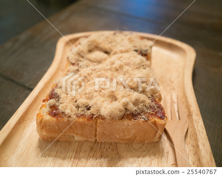 shredded dried pork toast on wood tray  25540767