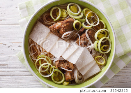 Korean beef ribs soup, noodles, leeks and daikon 25542225