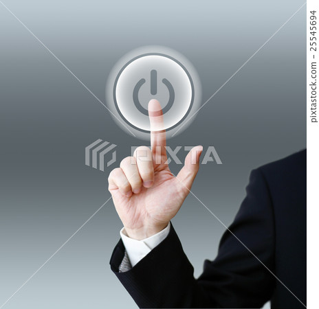Businessman pushing the power button Businessman pushing the power button 25545694
