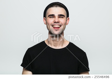 Hipster showing his pierced tongue. 25546496