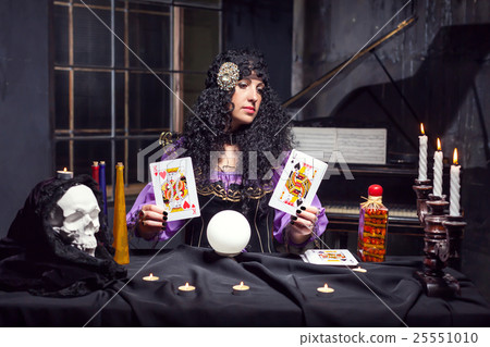Sorceress while practising witchcraft Sorceress while practising witchcraft 25551010