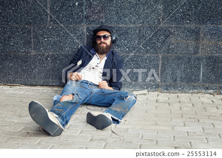 Vagrant in earphones 25553114