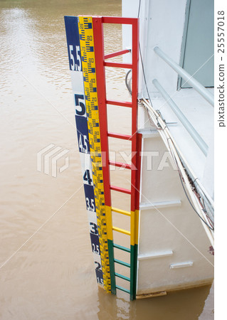Water level meter in the river Water level meter in the river 25557018