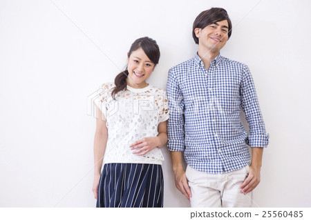 A man standing side by side A man standing side by side 25560485