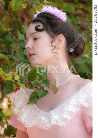 Portrait romantic girl in foliage Portrait romantic girl in foliage 25565782