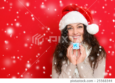 girl in santa hat portrait, christmas holiday 25568344