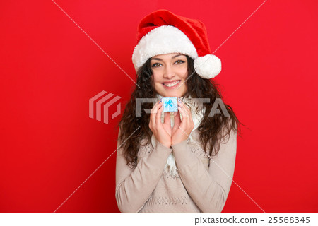 girl in santa hat portrait, christmas holiday girl in santa hat portrait, christmas holiday 25568345