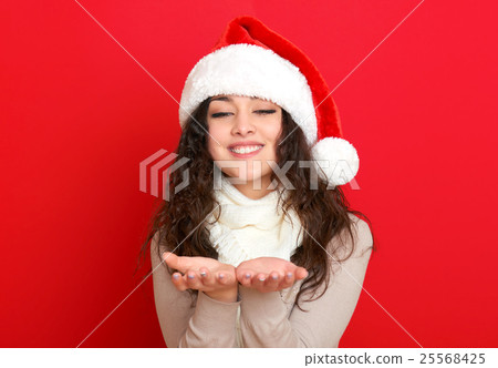 girl in santa hat portrait, new year holiday 25568425