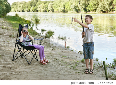 child camping and fishing, people active in nature 25568696