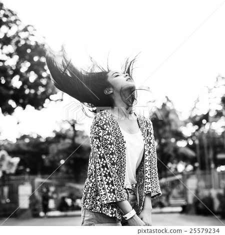 Young Girl Hair Fling Funfair Festive Playful Happiness Concept 25579234