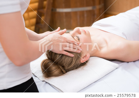 Spa. Masseuse put her hands on girl's face 25579578