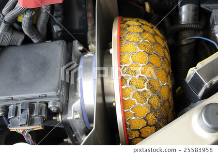 Big yellow engine air-filter in racing car 25583958
