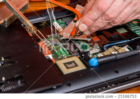 Man soldering computer Man soldering computer 25586753