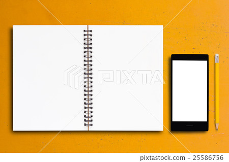 Notebook and Mobile Phone on Yellow Background Notebook and Mobile Phone on Yellow Background 25586756
