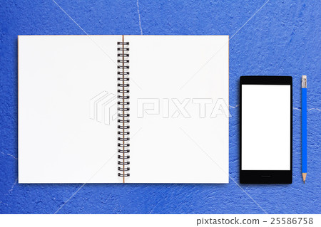 Notebook and Mobile Phone on Blue Background Notebook and Mobile Phone on Blue Background 25586758