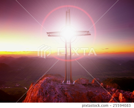Lens flare light. Cross on peak of Hoher Goell Lens flare light. Cross on peak of Hoher Goell 25594083