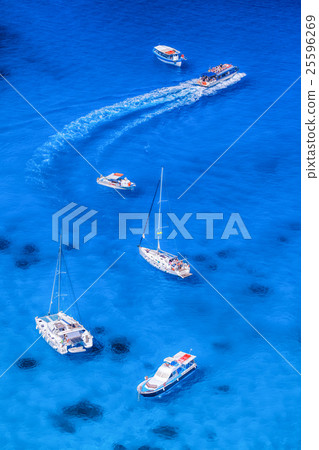 boats and yachts on the azure sea 25596269
