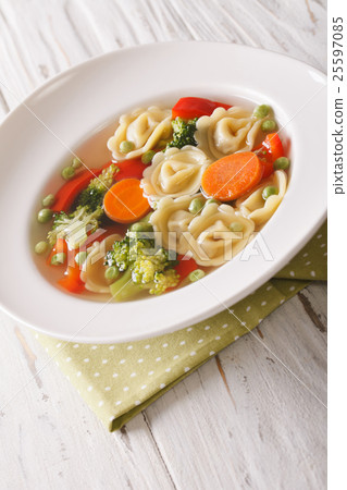 tortellini soup with broccoli, peas, carrot 25597085
