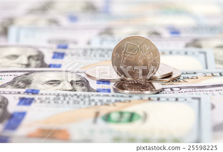 Russian rubles coins over dollars banknotes  25598225