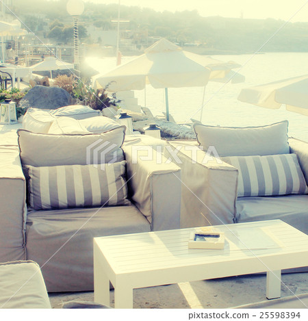 relax terrace with armchairs on sea coast, Greece 25598394